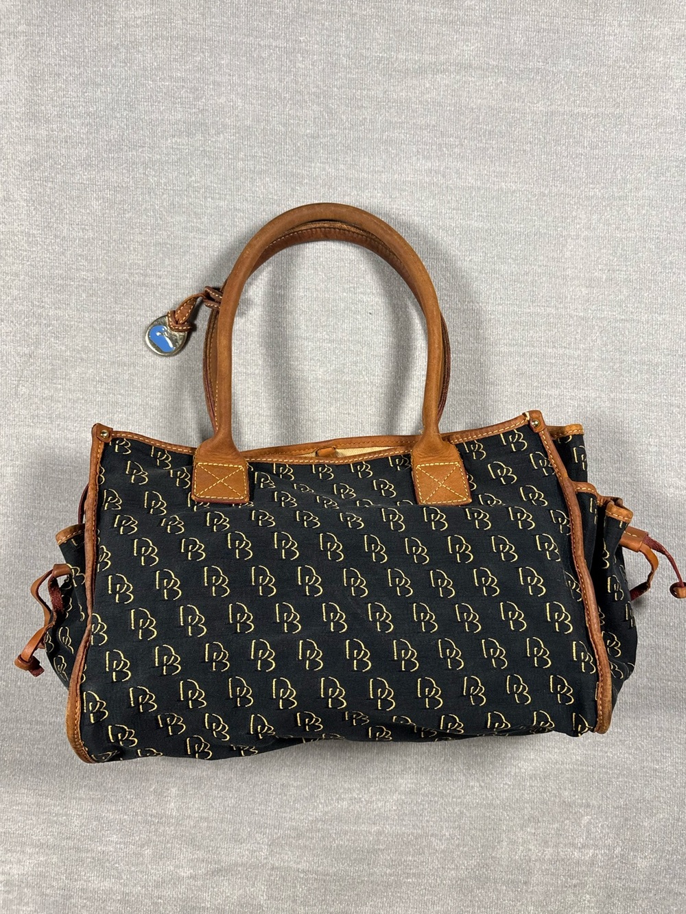 Dooney & Bourke Black Signature DB Tote with Brown Leather Trim